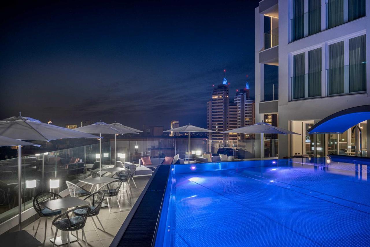 J44 Lifestyle Hotel Τζεσόλο Λίντο Εξωτερικό φωτογραφία The swimming pool at the hotel